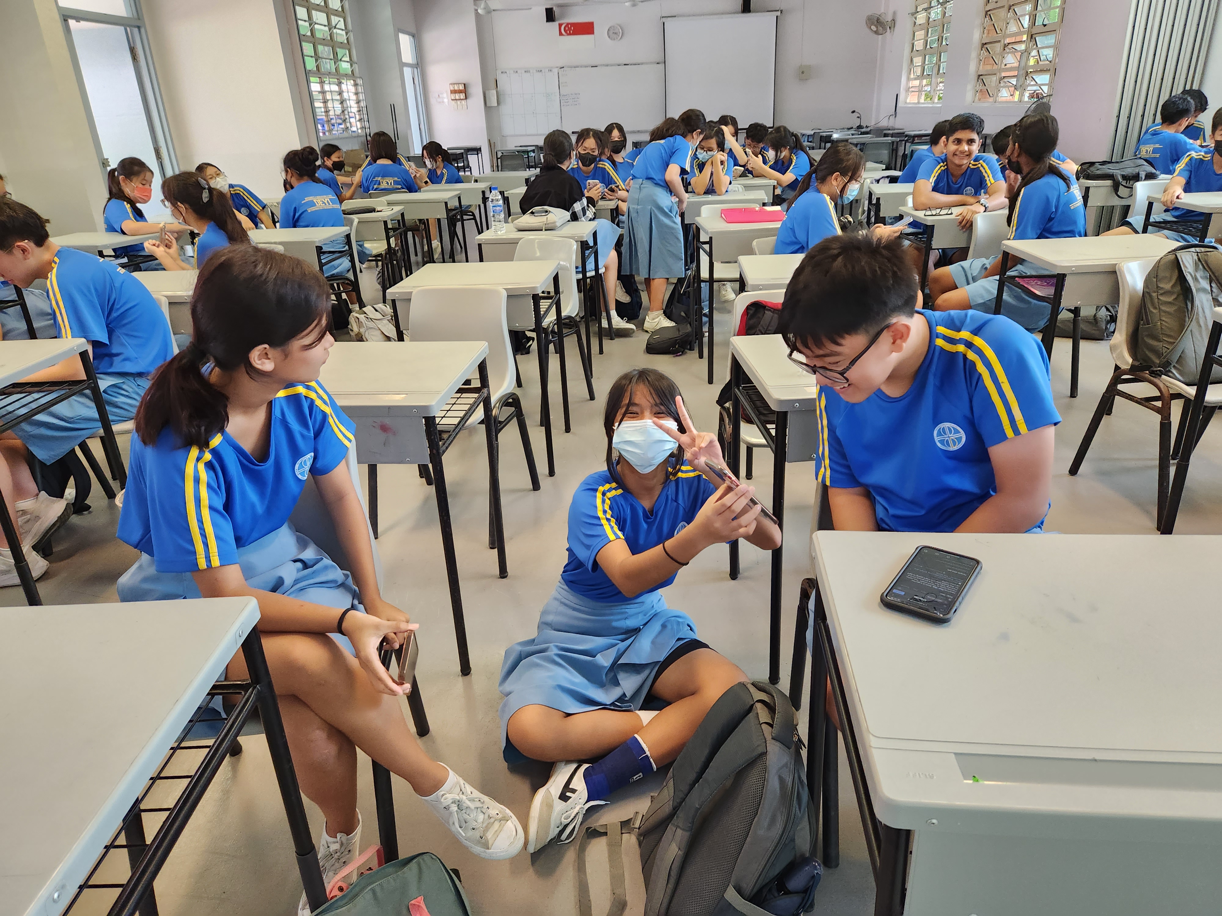 International students and their buddies searching the web to find meanings of their names